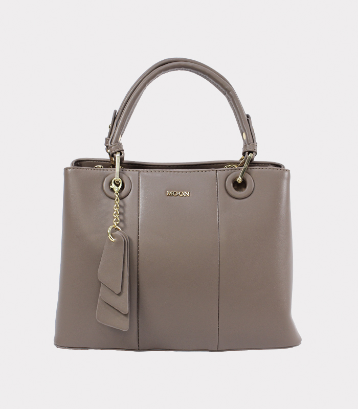 cartera-azul-con-dijes-de-biocuero-colgantes