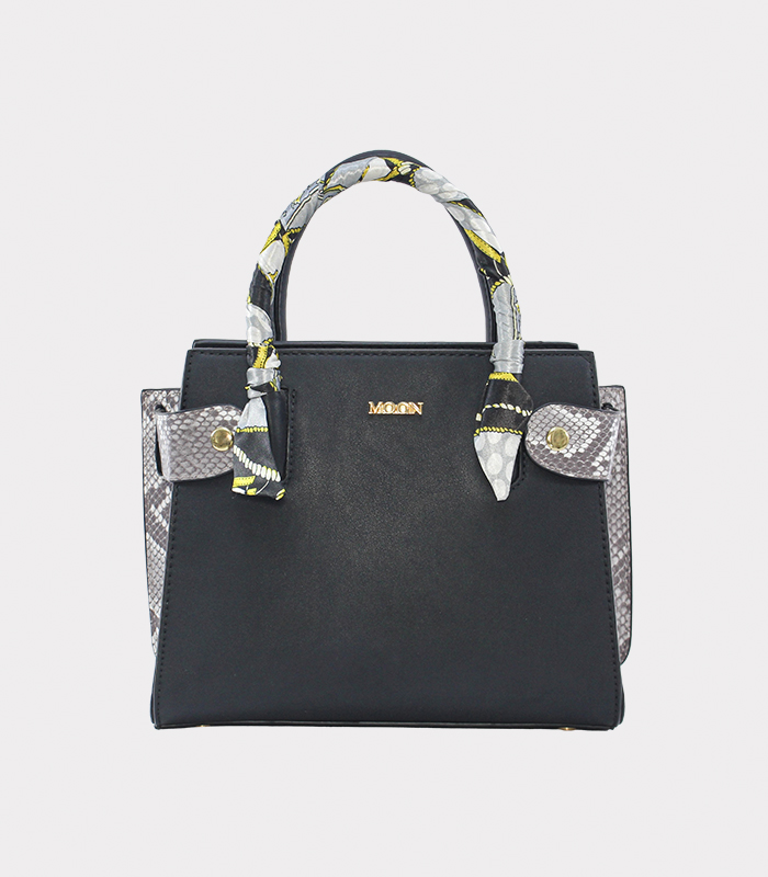 carteras trapecio con costados animal print piton